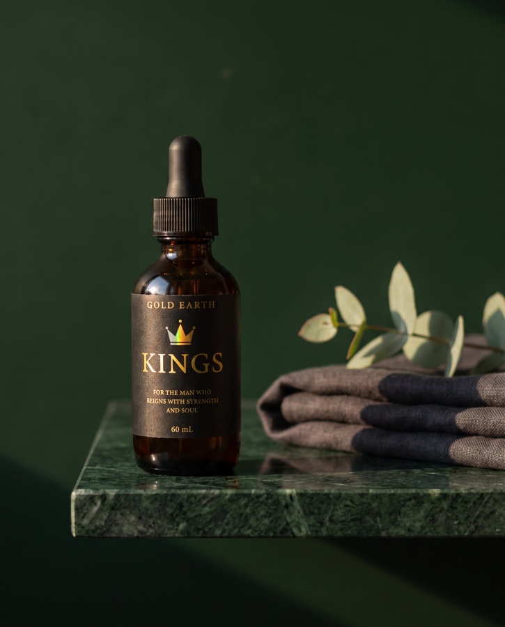 Kings Oil on green marble against a deep green wall